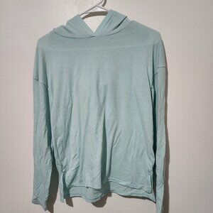 A semi-sheer light blue long sleeve shirt (kids)